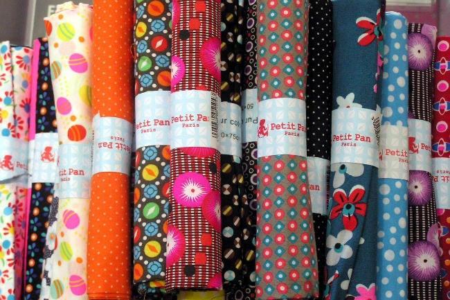 Qui connaît une boutique réputée à Reims pour acheter de beaux tissus de qualité ?